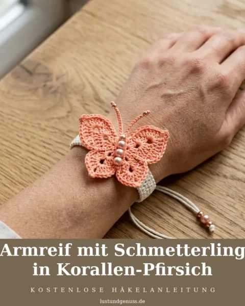 Armreif mit Schmetterling in Korallen-Pfirsich