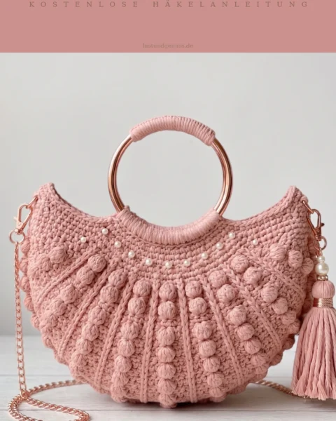Muschel-Clutch in Rosé mit Perlen häkeln